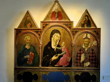 Madonna col bambino tra i santi Pietro e Romolo